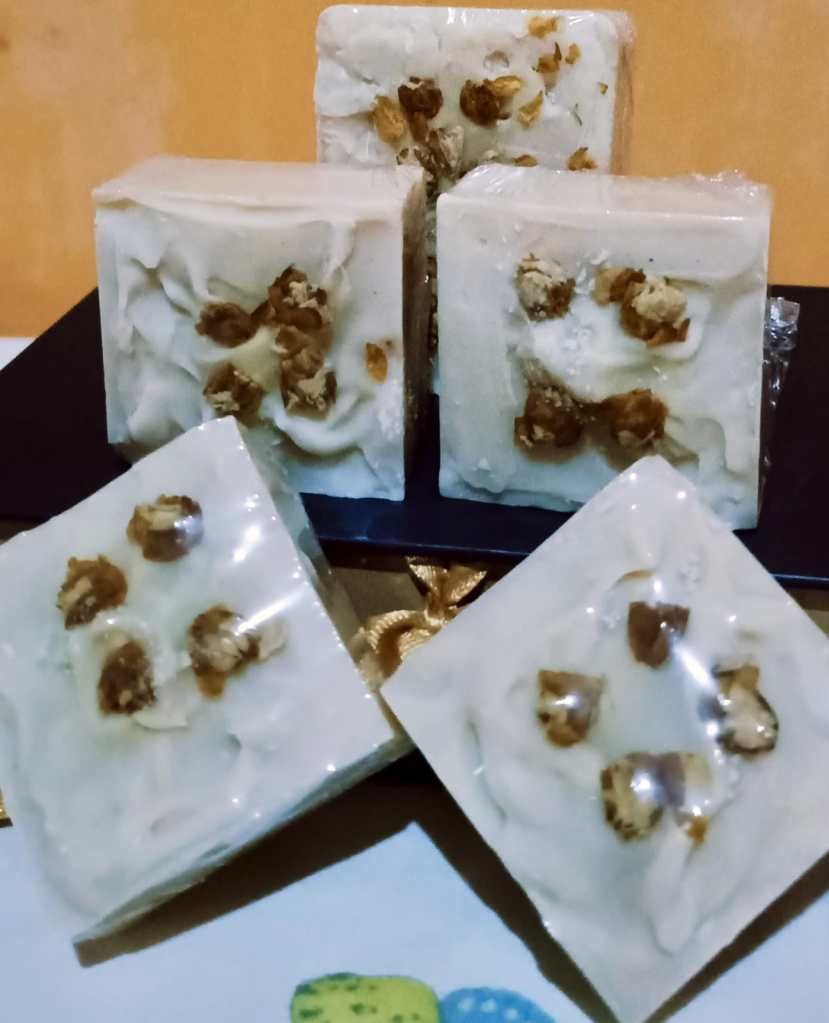 Aromatherapy soap with a sprinkling of dried jasmine flowers